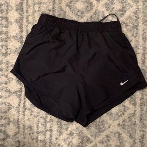Black Nike running shorts
